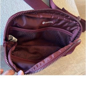Lululemon Wine Berry 1L belt bag.